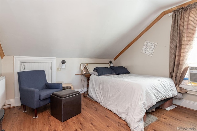 835 N Union Blvd, Colorado Springs, CO 80909 - bedroom with wood finished floors and lofted ceiling
