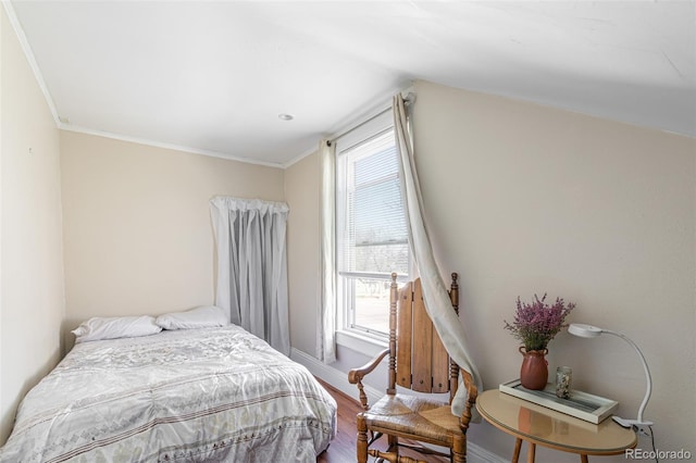 835 N Union Blvd, Colorado Springs, CO 80909 - bedroom with wood finished floors, ornamental molding, and vaulted ceiling