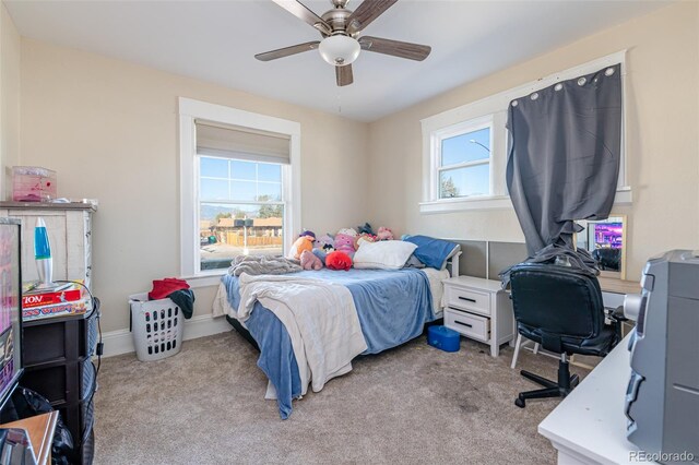 835 N Union Blvd, Colorado Springs, CO 80909 - bedroom featuring light colored carpet, an office area, and ceiling fan