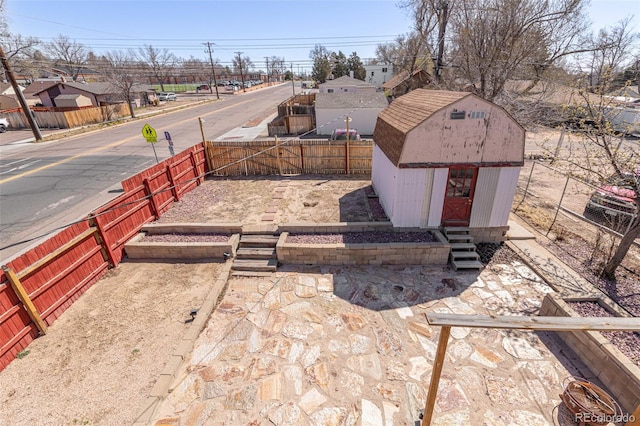 835 N Union Blvd, Colorado Springs, CO 80909 - fenced backyard with a storage unit and a residential view