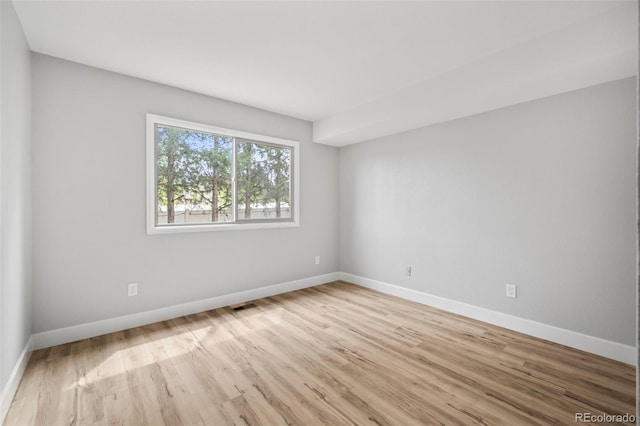 empty room featuring light hardwood / wood-style flooring