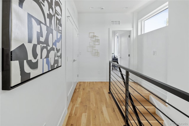 hallway featuring light wood-type flooring