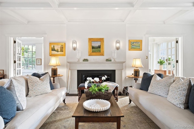 living room featuring beamed ceiling, coffered ceiling, and crown molding