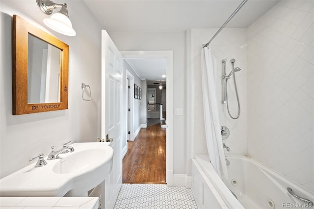 bathroom featuring vanity, shower / bath combo, and hardwood / wood-style flooring