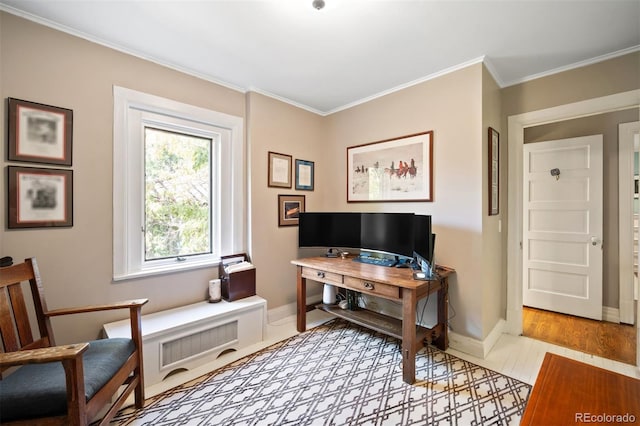 office area with crown molding and hardwood / wood-style flooring