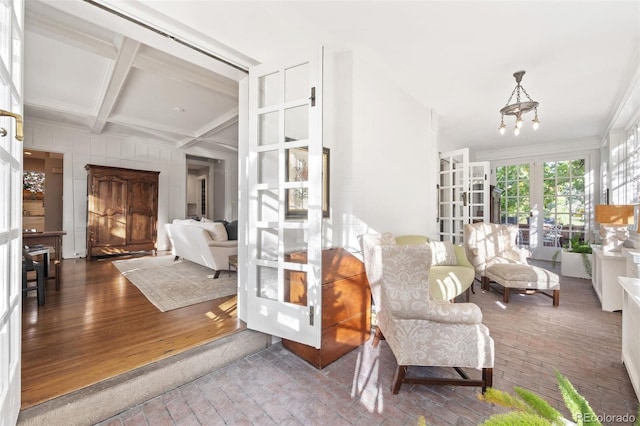 141 N Gilpin St, Denver, CO 80218 - sunroom / solarium featuring french doors, a chandelier, coffered ceiling, and beamed ceiling