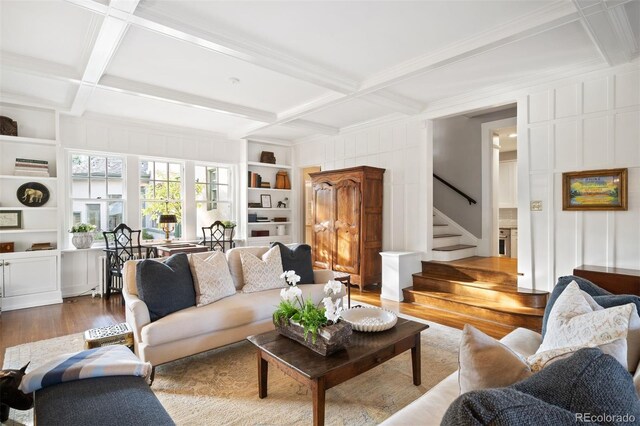 141 N Gilpin St, Denver, CO 80218 - living room featuring a decorative wall, coffered ceiling, wood finished floors, built in features, and stairs