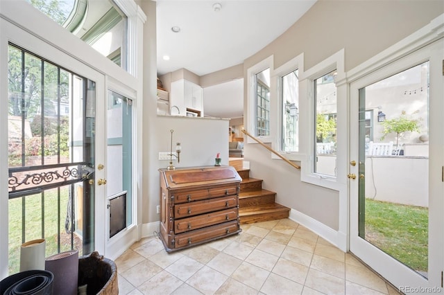 141 N Gilpin St, Denver, CO 80218 - foyer entrance featuring stairway and light tile patterned floors