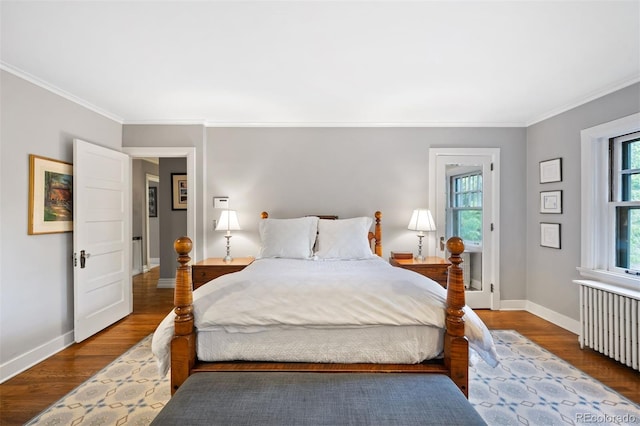 141 N Gilpin St, Denver, CO 80218 - bedroom featuring ornamental molding, radiator heating unit, and wood finished floors