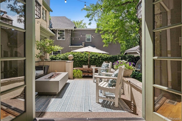141 N Gilpin St, Denver, CO 80218 - view of patio / terrace with a fire pit and a deck