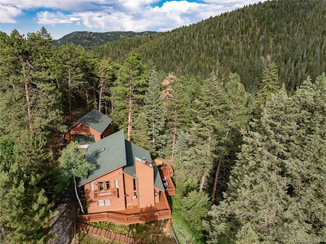 31673 Ponderosa Way, Evergreen, CO 80439 - aerial view of property and surrounding area featuring a heavily wooded area
