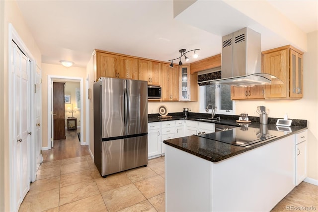 31673 Ponderosa Way, Evergreen, CO 80439 - kitchen with appliances with stainless steel finishes, island range hood, a peninsula, glass insert cabinets, and light tile patterned floors