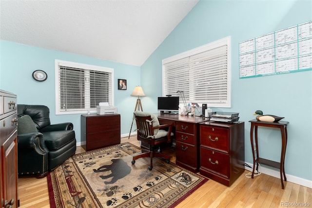31673 Ponderosa Way, Evergreen, CO 80439 - office space with lofted ceiling and light wood finished floors