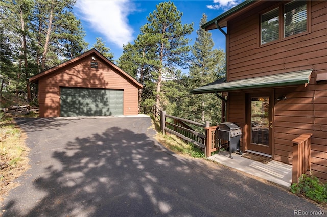31673 Ponderosa Way, Evergreen, CO 80439 - detached garage with asphalt driveway