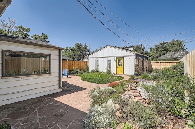 4883 Perry St, Denver, CO 80212 - view of yard with a patio and an outdoor structure