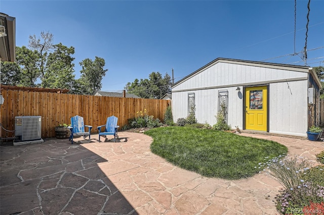 4883 Perry St, Denver, CO 80212 - fenced backyard featuring a patio area