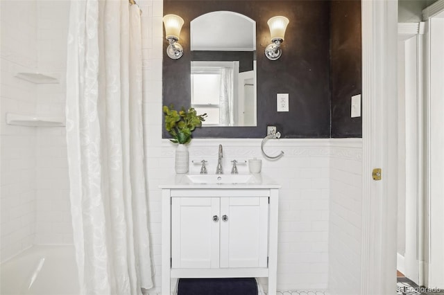 4883 Perry St, Denver, CO 80212 - full bath featuring vanity and shower / bath combo