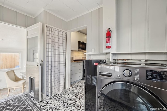 4883 Perry St, Denver, CO 80212 - laundry room with washer / clothes dryer and crown molding