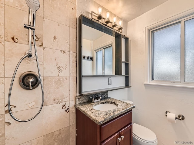 170 W Midway Blvd, Broomfield, CO 80020 - full bath with toilet, vanity, and a tile shower