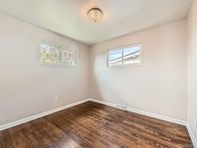 170 W Midway Blvd, Broomfield, CO 80020 - unfurnished room with plenty of natural light, baseboards, and dark wood-style flooring