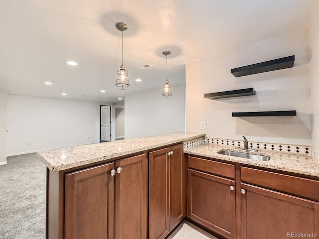 170 W Midway Blvd, Broomfield, CO 80020 - kitchen with a sink, open shelves, a peninsula, light stone counters, and recessed lighting