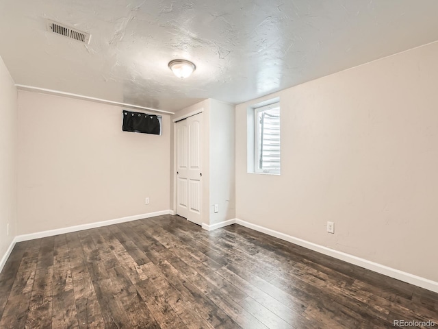170 W Midway Blvd, Broomfield, CO 80020 - below grade area featuring dark wood-style floors and baseboards