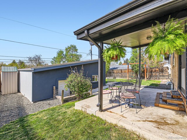 170 W Midway Blvd, Broomfield, CO 80020 - view of patio / terrace featuring an outbuilding