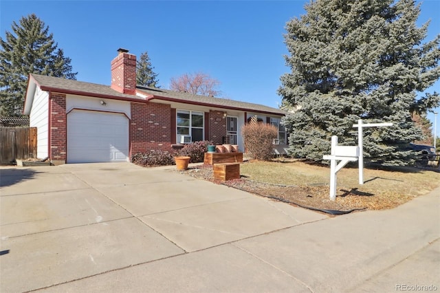 single story home with concrete driveway, a chimney, an attached garage, fence, and brick siding