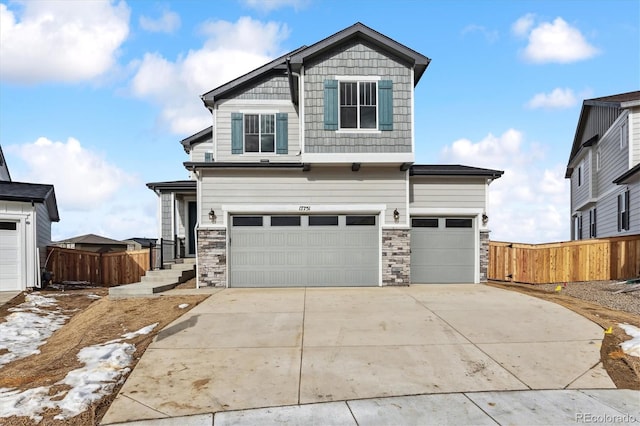 view of front of home with a garage