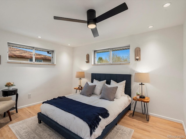 bedroom featuring ceiling fan and light wood-type flooring