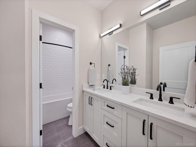 full bathroom featuring tile patterned floors, vanity, toilet, and shower / bathing tub combination