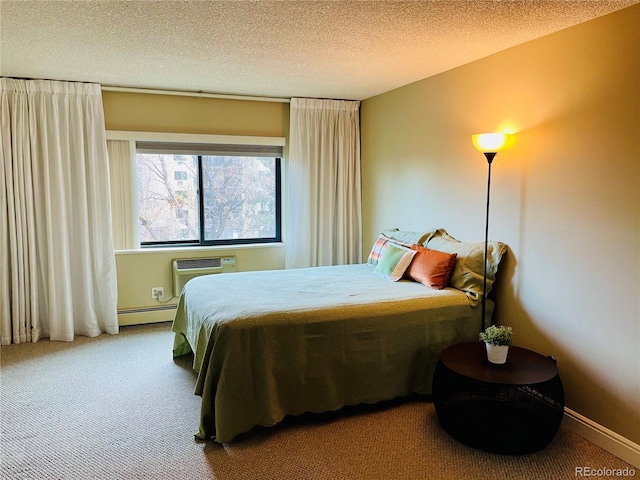 bedroom featuring carpet, an AC wall unit, a textured ceiling, and a baseboard radiator