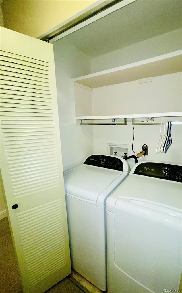 washroom featuring independent washer and dryer