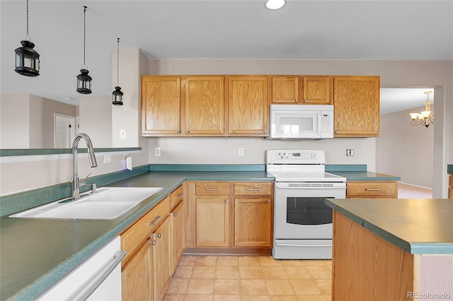 kitchen featuring sink, hanging light fixtures, white appliances, and a notable chandelier