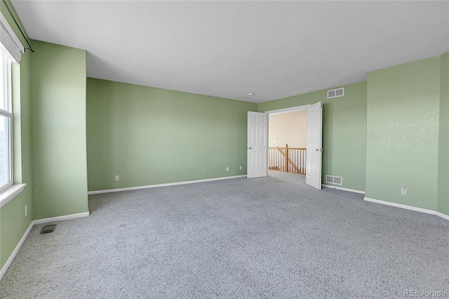 unfurnished bedroom featuring carpet