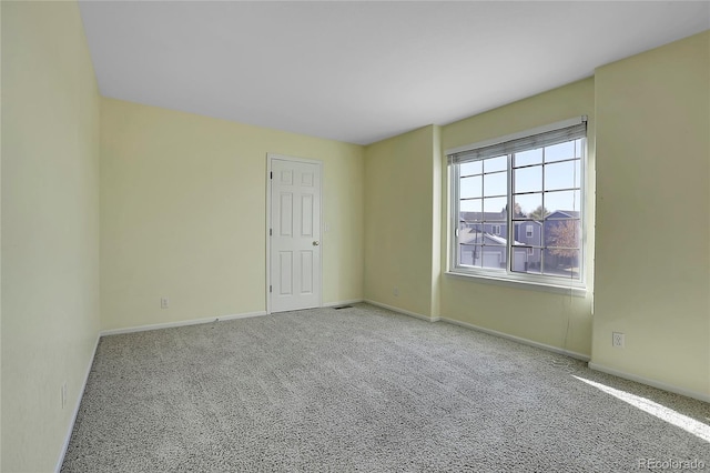 empty room with carpet floors