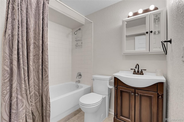 full bathroom with toilet, vanity, tile patterned floors, and shower / tub combo with curtain