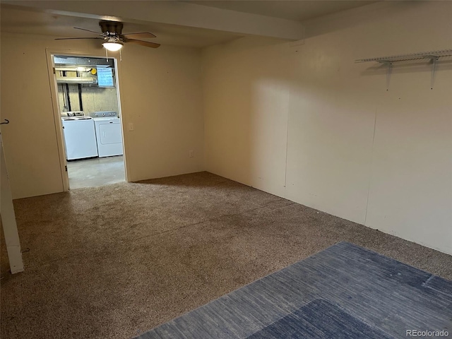 empty room featuring ceiling fan, carpet floors, and washer and clothes dryer