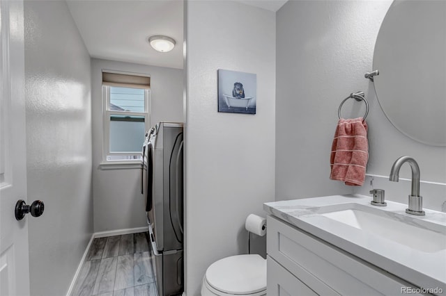 5075 Weeping Willow Cir, Highlands Ranch, CO 80130 - bathroom featuring vanity and washer / dryer
