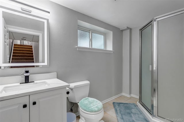 5075 Weeping Willow Cir, Highlands Ranch, CO 80130 - full bathroom featuring vanity, a shower stall, and tile patterned floors