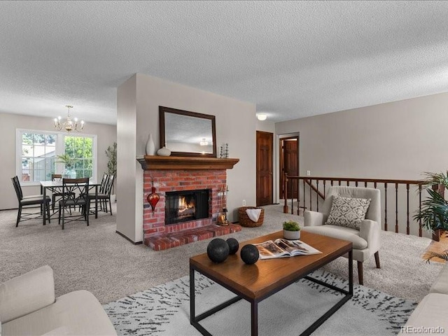 7101 W Yale Ave Unit 1305, Denver, CO 80227 - living room featuring a chandelier, carpet, a textured ceiling, and a brick fireplace