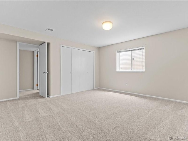 7101 W Yale Ave Unit 1305, Denver, CO 80227 - unfurnished bedroom featuring carpet and a closet