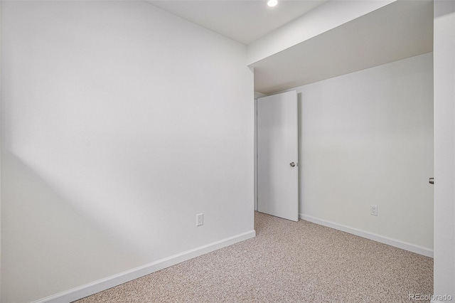 unfurnished room with carpet