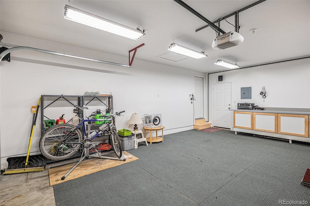 garage featuring a garage door opener and electric panel