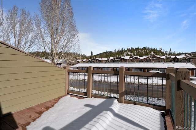 view of snow covered deck