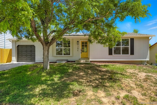 17875 E Carolina Pl, Aurora, CO 80017 - ranch-style home with an attached garage and asphalt driveway