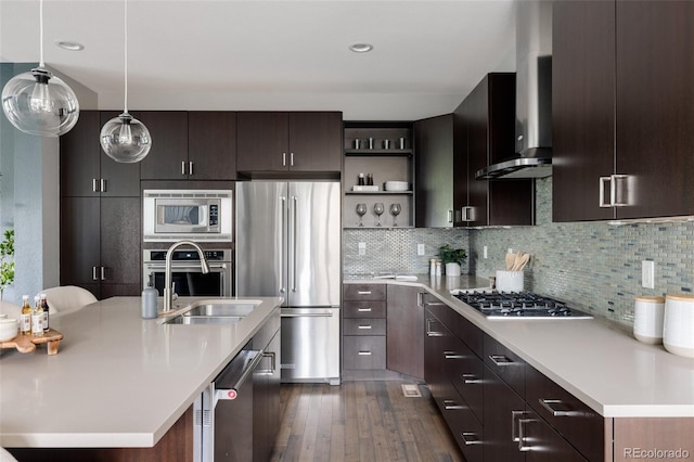 3473 Beeler St, Denver, CO 80238 - kitchen with appliances with stainless steel finishes, wall chimney range hood, light countertops, dark wood-style flooring, and open shelves