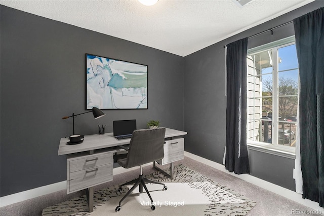 4076 S Carson St Unit H, Aurora, CO 80014 - carpeted office featuring plenty of natural light and a textured ceiling