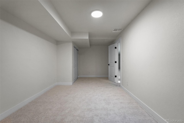 interior space featuring light colored carpet