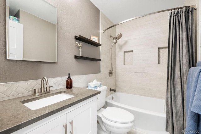 full bathroom with toilet, shower / tub combo, vanity, and decorative backsplash